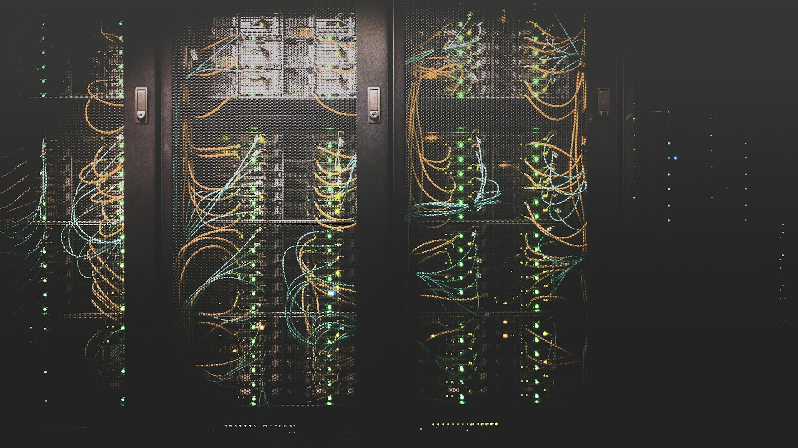 Rows of server racks inside a data center
